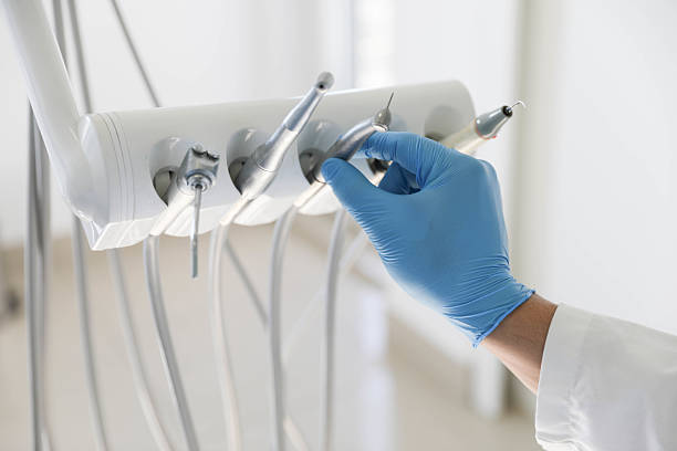 Professional Emergency Dentist technician working in Taylor, TX